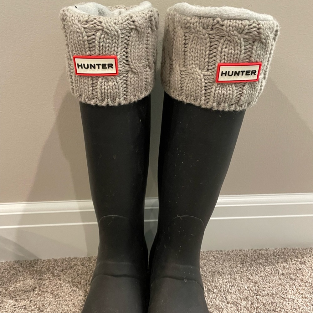 Hunter tall rain boots with gray socks